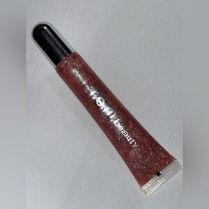 r.e.m. beauty on your collar plumping lip gloss - fembot